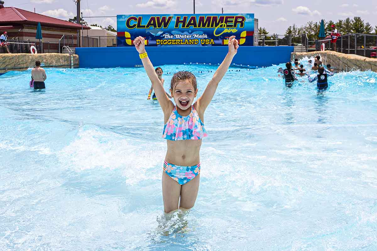 https://diggerlandusa.com/wp-content/uploads/opt-girl-cheering-with-hands-up-in-wave-pool-landscape.jpg